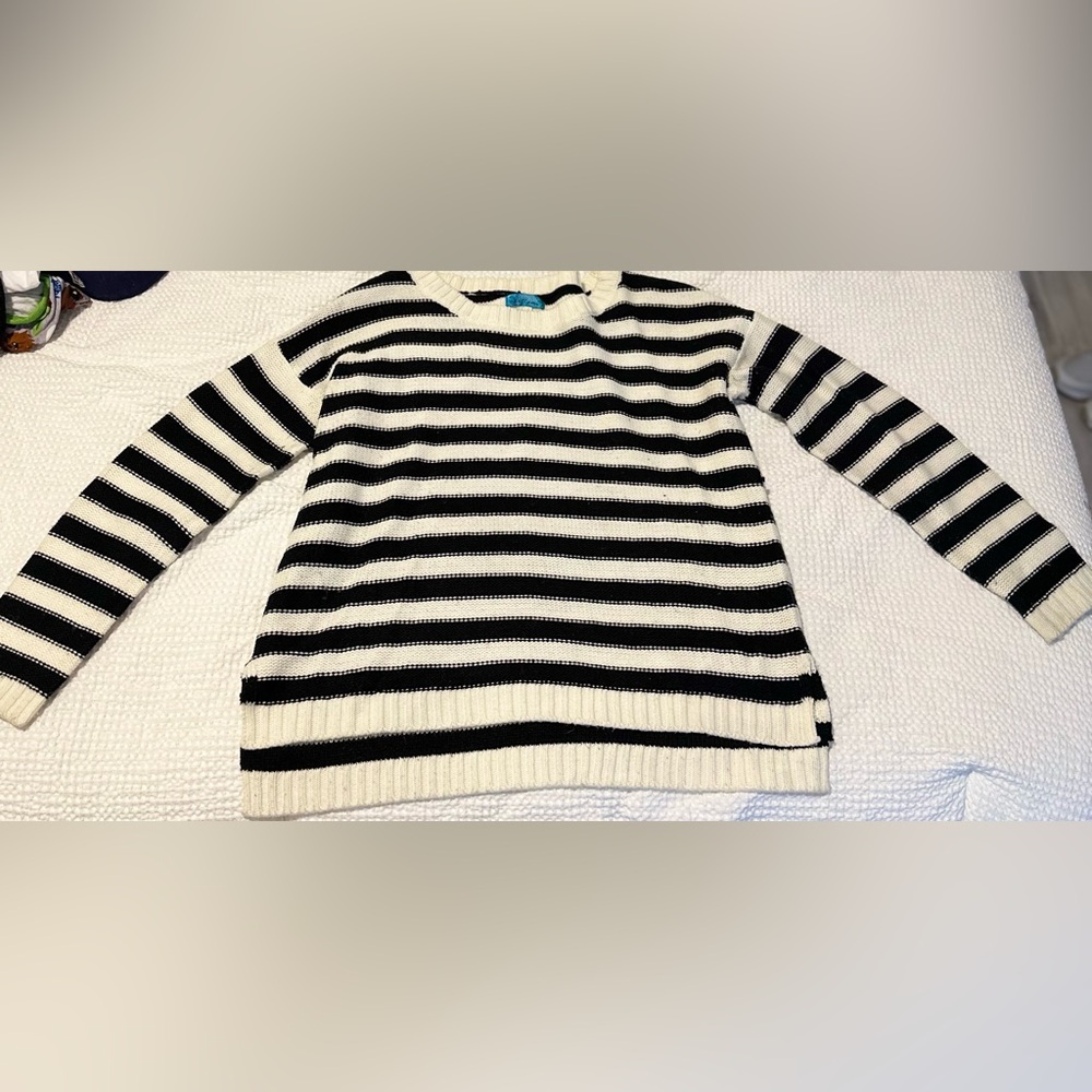 Striped black and white sweater with red heart elbow patches